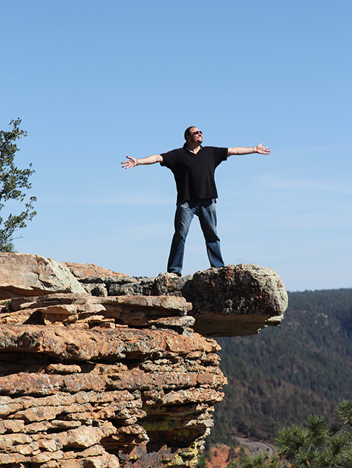 Steve Colby on a cliff edge